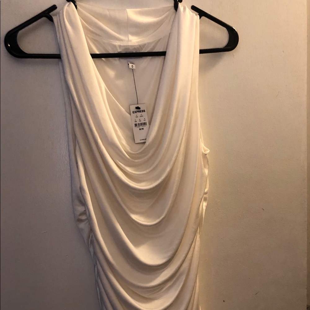 Off white sleeveless blouse